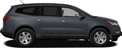 Side view of midsize SUV with alloy wheels and tinted windows
