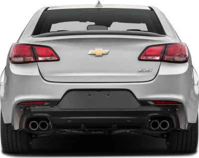 Rear view with dual exhaust pipes and modern tail light design