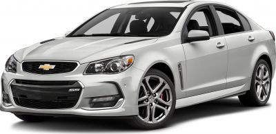Silver performance sedan with aggressive front grille and alloy wheels
