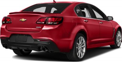Rear view with sharp tail lights and dual exhaust pipes on sporty sedan