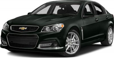 Front grille and alloy wheels of a sedan