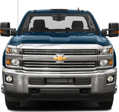 Front view with chrome grille and towing mirrors