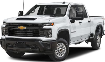 Front view of a heavy-duty pickup with bold grille and hood scoop