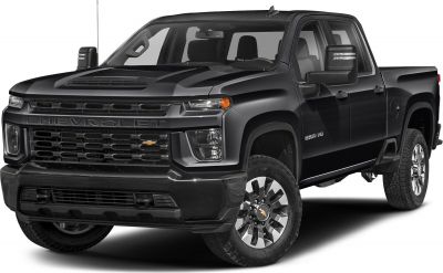 Robust front view of a double cab pickup with prominent grille and rugged tires