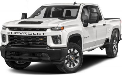 Front and side view of a white double cab pickup with heavy-duty features.