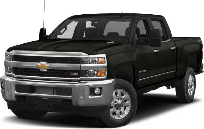 Heavy-duty truck with double cab and standard bed, featuring robust front grille and Z71 trim.