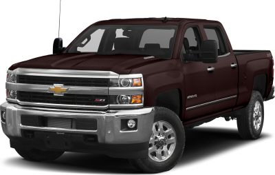 Front and side view of heavy duty pickup with long box and robust grille