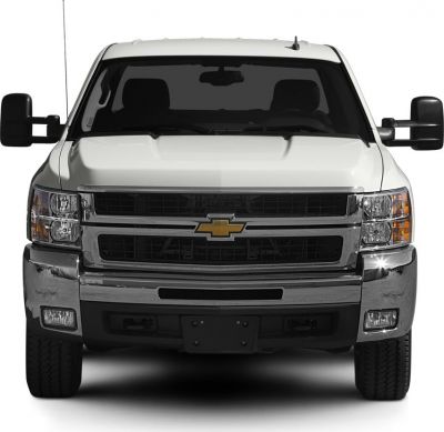 Front view of heavy duty truck with extended cab and chrome grille
