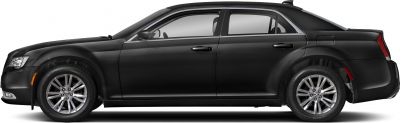 Side profile of black luxury sedan with chrome wheels
