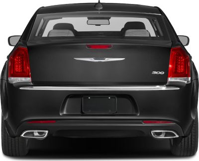 Rear view with distinctive taillights and dual exhausts