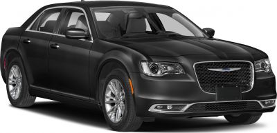 Front grille with chrome accents and LED headlights of a sedan