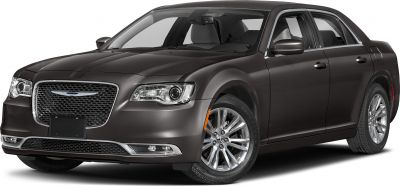 Front view of a sedan with distinctive grille and LED headlights