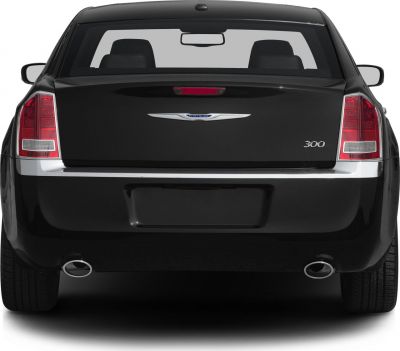 Rear view showing dual exhausts and distinctive tail lights