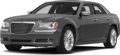 Chrome grille and sleek headlights on a luxury sedan front view