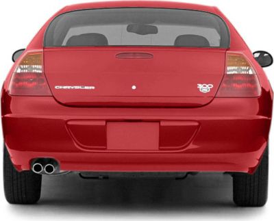 Red car rear with dual exhaust and transparent taillights