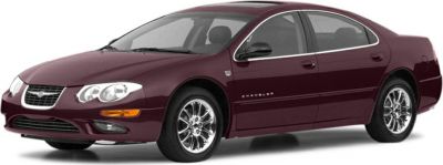 Front-side profile of a sedan highlighting headlight and chrome rim details