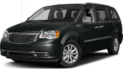 Front-side view of minivan with alloy wheels and headlight details