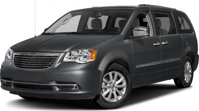 Front side view of a minivan with alloy wheels and visible side doors
