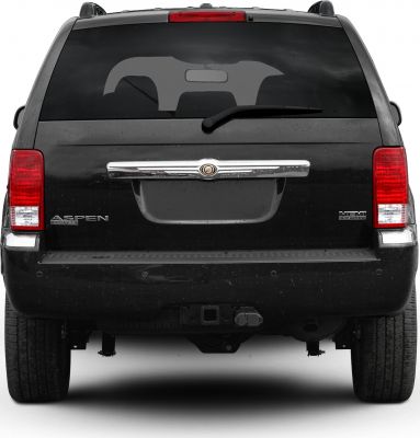 Rear view of SUV with tail lights and HEMI 5.7L badge