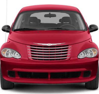 Close-up front grill and headlights of a compact car