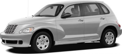 Side profile of a silver retro-styled compact hatchback with rounded design.