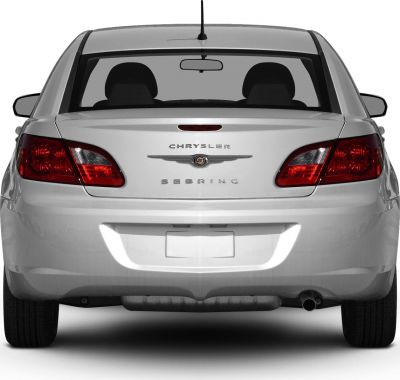 Rear view of a sedan with distinctive taillights and badges