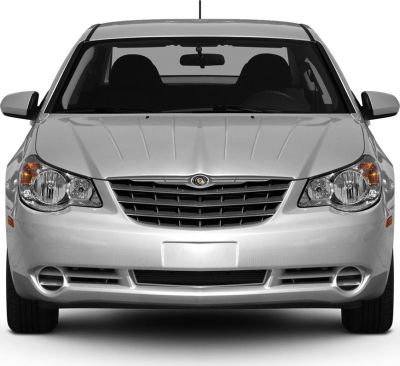 Front view with distinctive grille and headlights