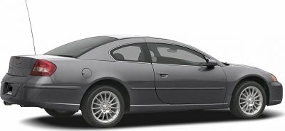 Sleek side profile of two-door coupe with alloy wheels