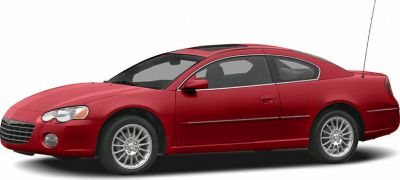 Red two-door coupe with alloy wheels and smooth, aerodynamic body lines