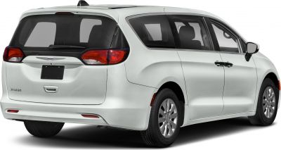 Rear side view of minivan with sliding doors and taillights