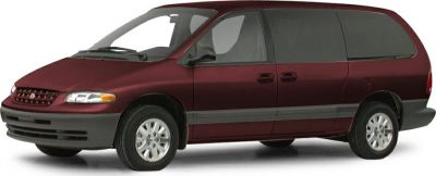 Side profile of a classic minivan with sliding doors and tinted windows
