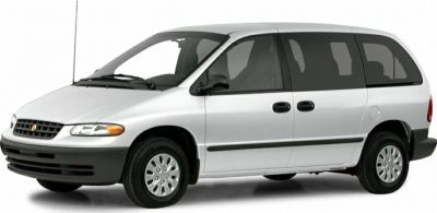 White minivan with sliding side doors and black front bumper