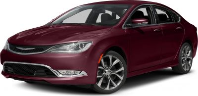 Front-side view of a sedan with sleek headlights and alloy wheels