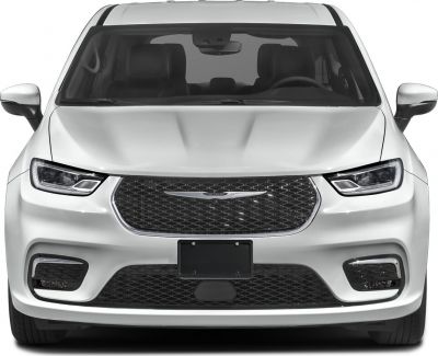 Minivan front view with modern headlights and mesh grille design