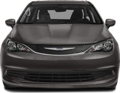 Front view with sleek headlights and honeycomb grille