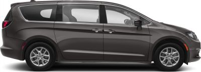 Side profile of minivan with sliding doors and alloy wheels
