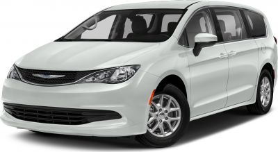 Front angle of a modern minivan with distinctive headlights and grille design.