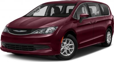 Front grille, headlights, alloy wheels, and sliding door of a minivan