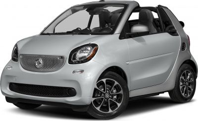 Compact two-seater convertible with distinctive front grille and alloy wheels