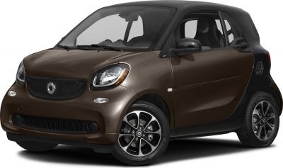 Compact two-door urban vehicle front and side profile with alloy wheels and distinctive grille