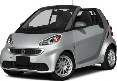 Front angle of a compact convertible microcar with open roof and alloy wheels