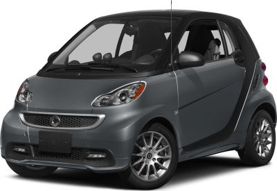 Compact coupe with dual headlights and alloy wheels