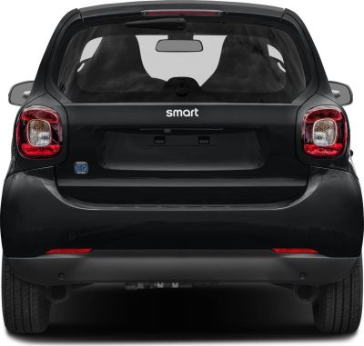 Rear view of compact electric hatchback with distinct taillights and rear glass window