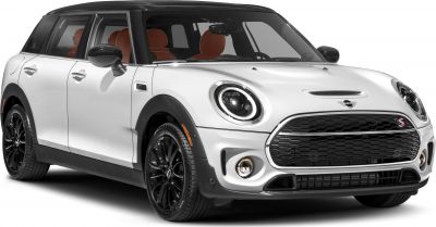 Front view with LED headlights, honeycomb grille, black wheels