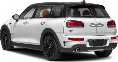 Rear side with split doors, black alloy wheels, and dual exhaust