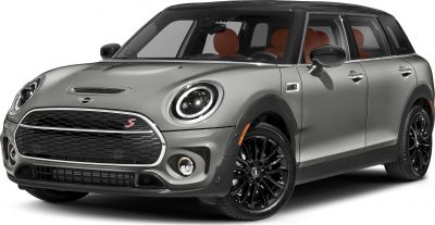 Front side view with round LED headlights and black multi-spoke wheels
