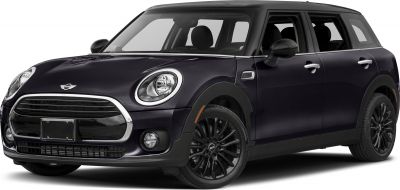 Round headlights and black multi-spoke alloy wheels with compact wagon design