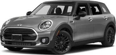 Front side view with round headlights and black alloy wheels