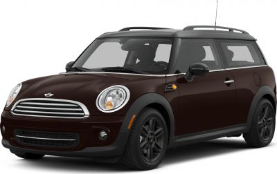 Front-side view with round headlights and black roof rails