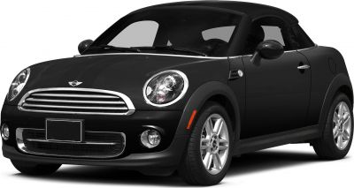 Front view with round headlights and chrome grille.